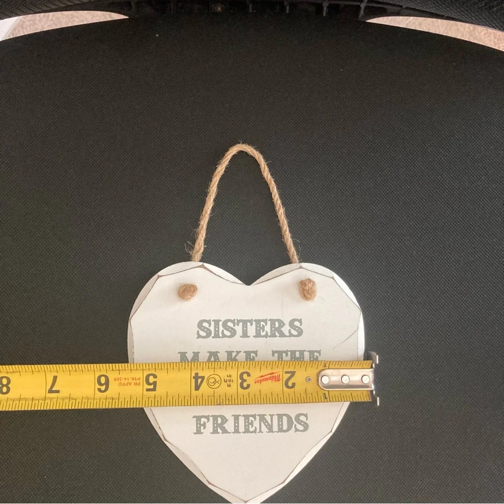 Heart Shaped wooden “sisters make the best friends” home decor